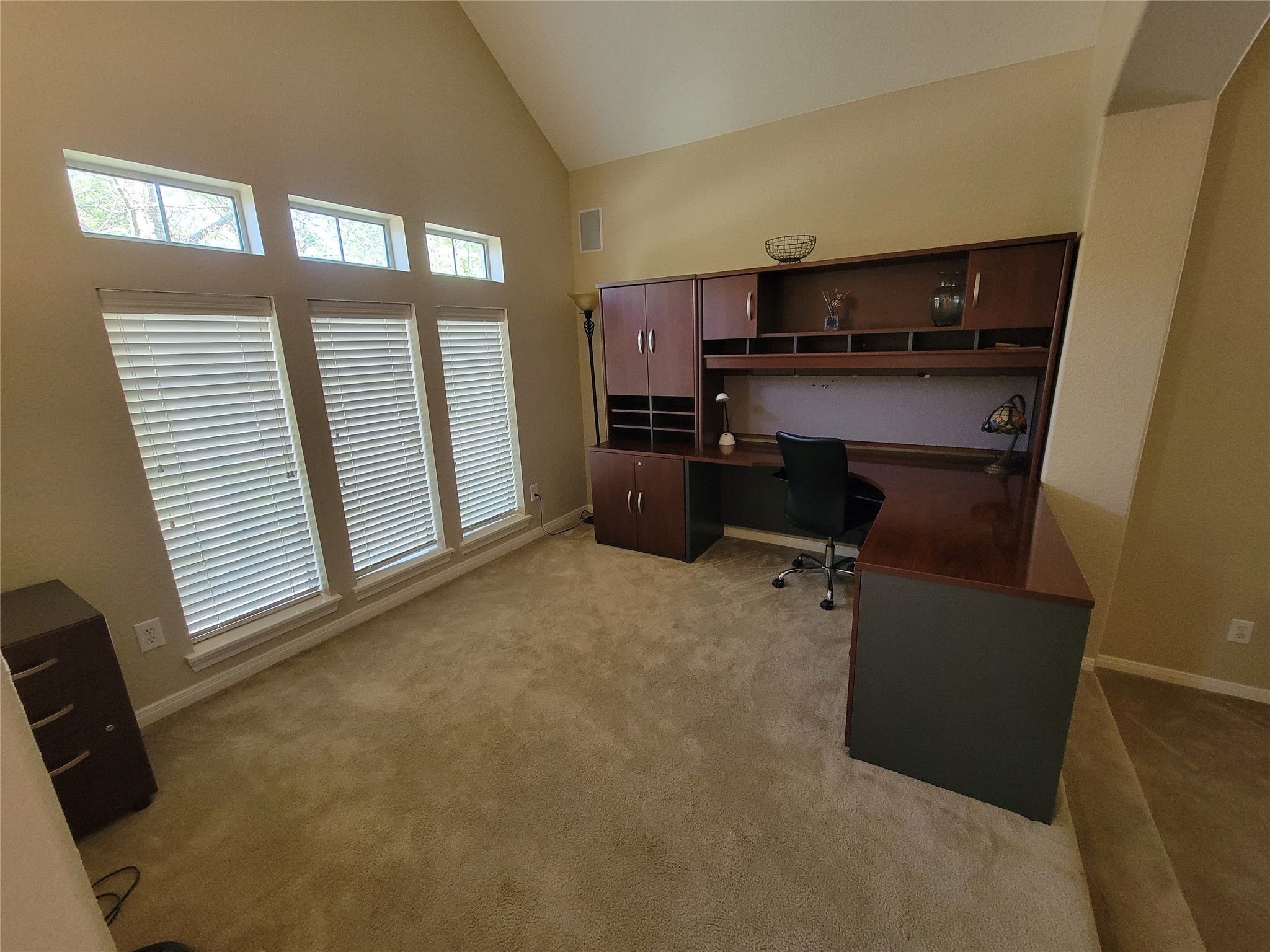 130 Zephyr Bend Place The Woodlands, TX 77381 - Photo 9 of 29 a workspace with furniture and window