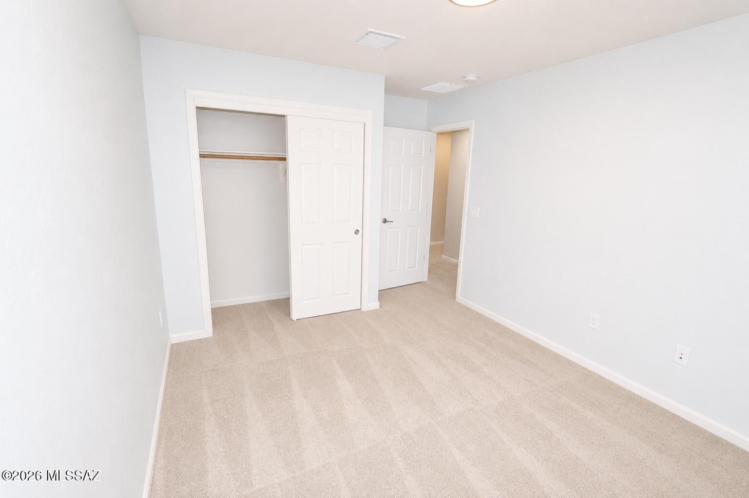 11484 East Desert Raptor Loop Tucson, AZ 85747 - Photo 5 of 28 a view of an empty room