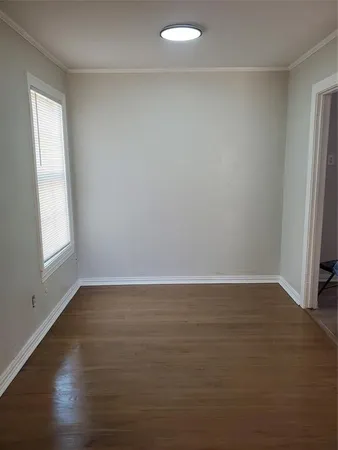 a kitchen with sink and cabinets
