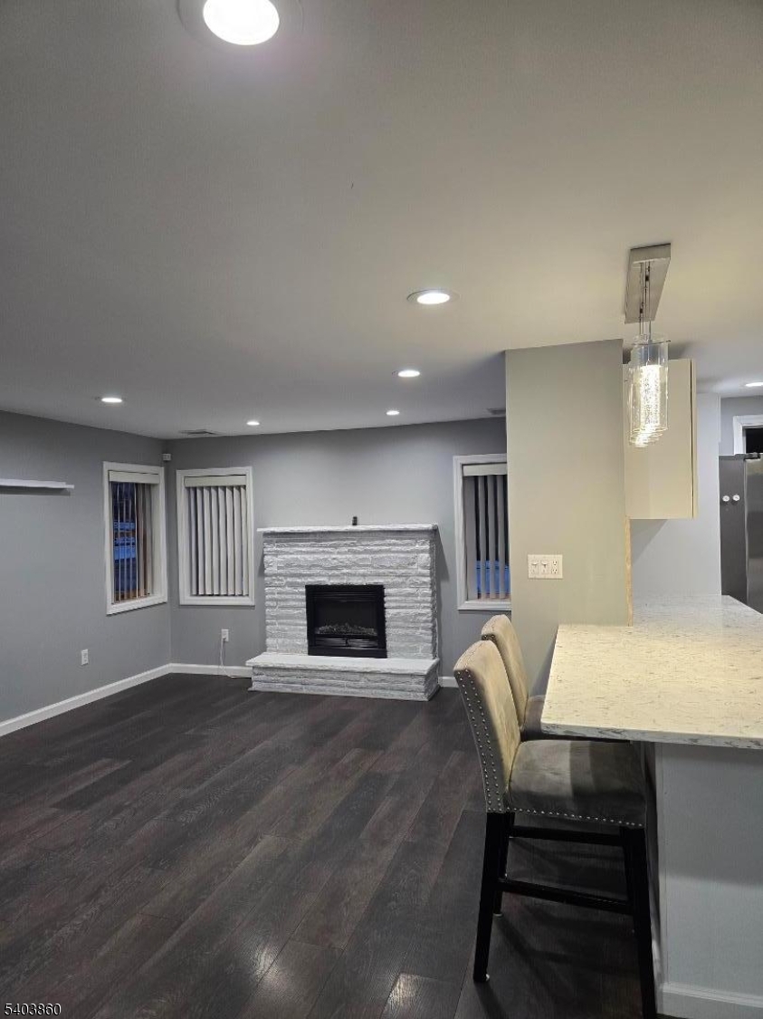 36 Wawayanda Road Vernon, NJ 07422 - Photo 19 of 34 a living room with furniture and a fireplace