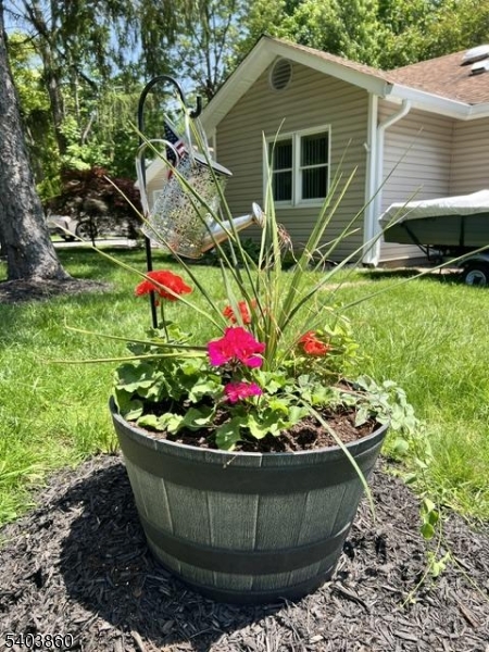 36 Wawayanda Road Vernon, NJ 07422 - Photo 23 of 34 a view of a house with a yard and potted plants