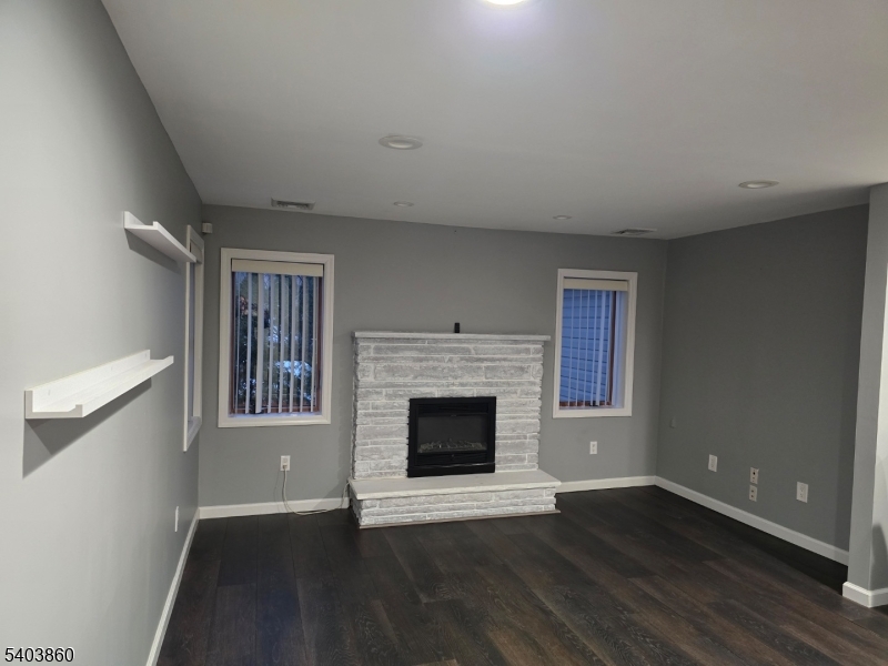 36 Wawayanda Road Vernon, NJ 07422 - Photo 5 of 34 wooden floor fireplace and windows in an empty room