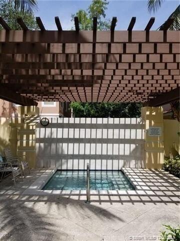 6774 West Sample Road, Unit 6774 Coral Springs, FL 33067 - Photo 10 of 12 Hot tub