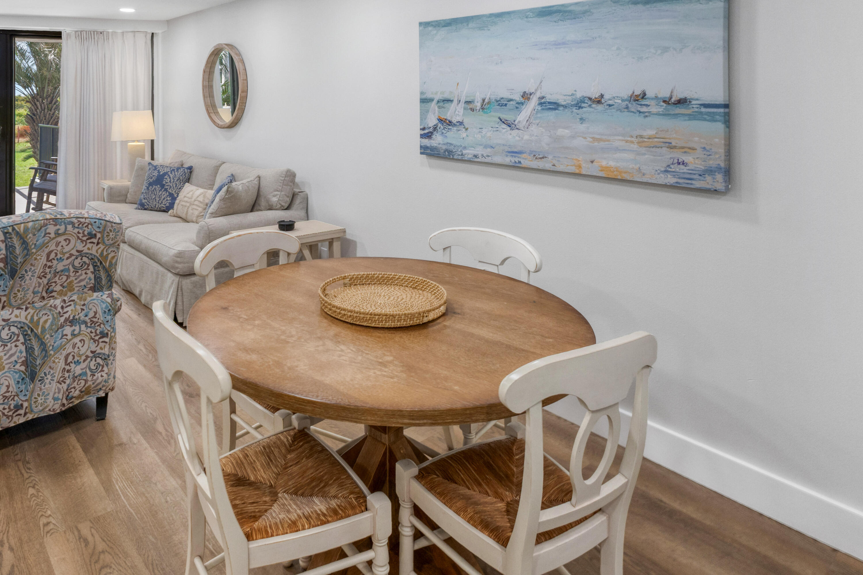 4017 Beachside 1, Unit 4017 Miramar Beach, FL 32550 - Photo 11 of 55 a view of a dining room with furniture and wooden floor