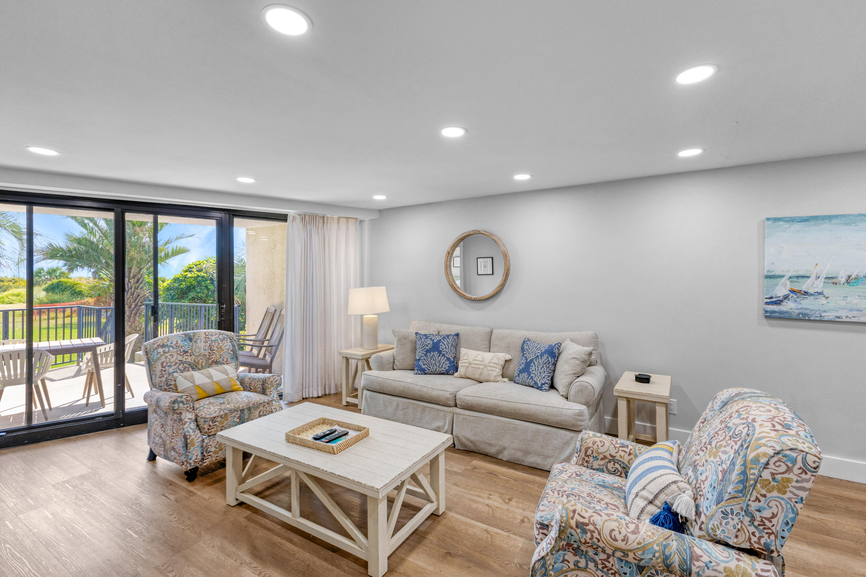4017 Beachside 1, Unit 4017 Miramar Beach, FL 32550 - Photo 12 of 55 a living room with furniture and a large window