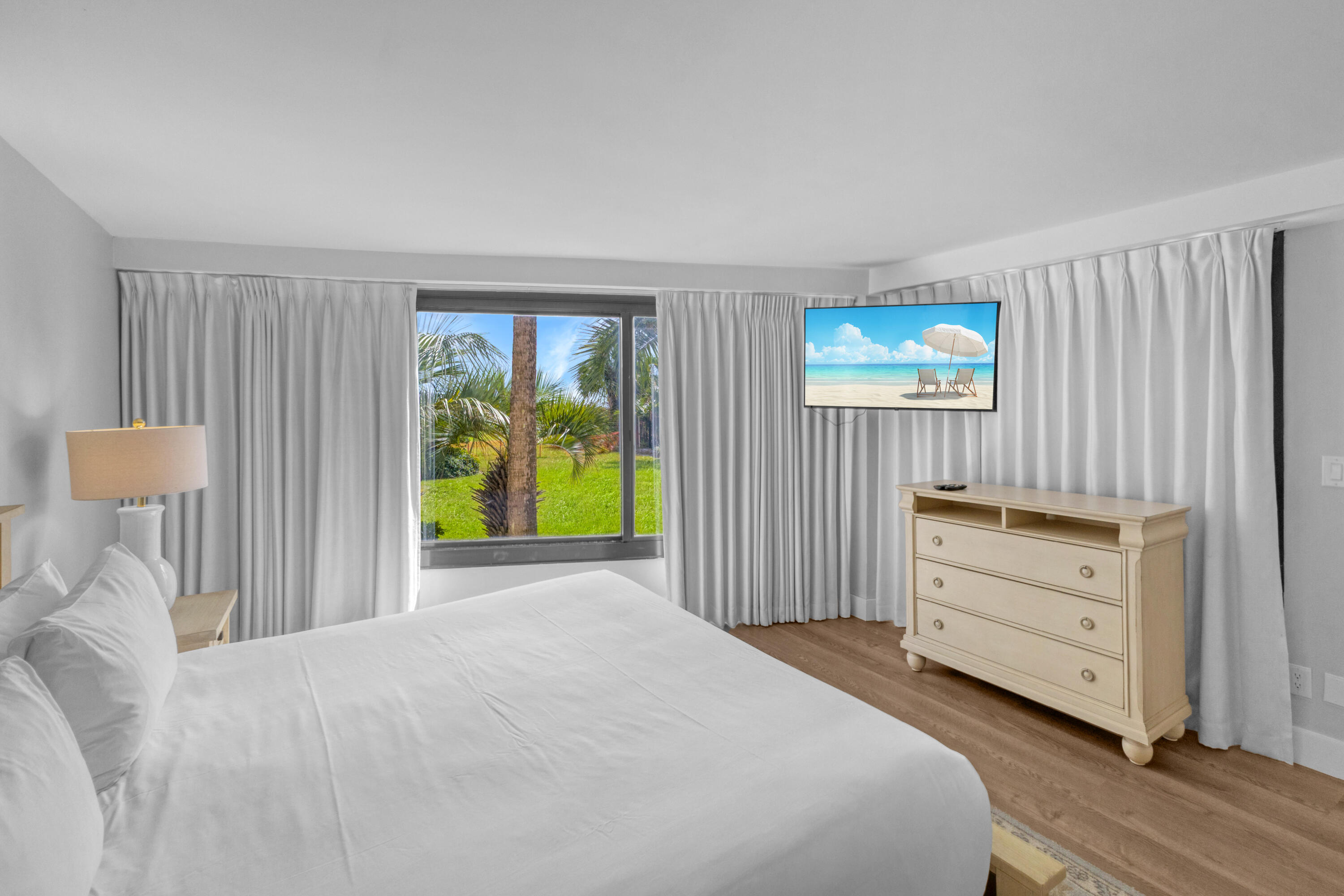 4017 Beachside 1, Unit 4017 Miramar Beach, FL 32550 - Photo 15 of 55 a bedroom with a bed and a window