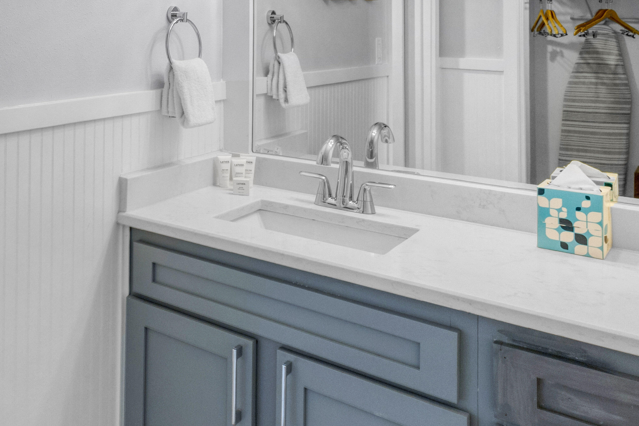 4017 Beachside 1, Unit 4017 Miramar Beach, FL 32550 - Photo 18 of 55 a bathroom with a sink and a mirror