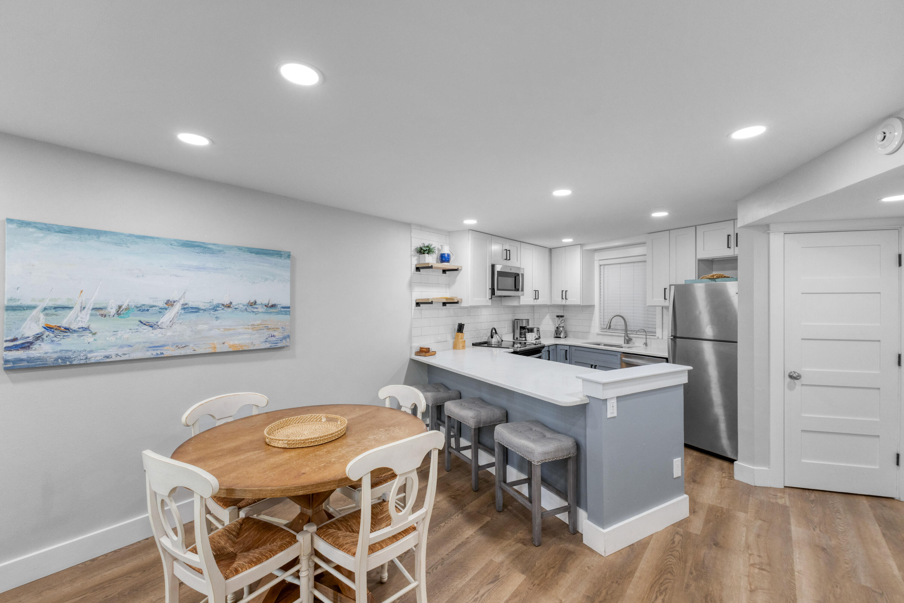 4017 Beachside 1, Unit 4017 Miramar Beach, FL 32550 - Photo 8 of 55 a kitchen with a table and chairs