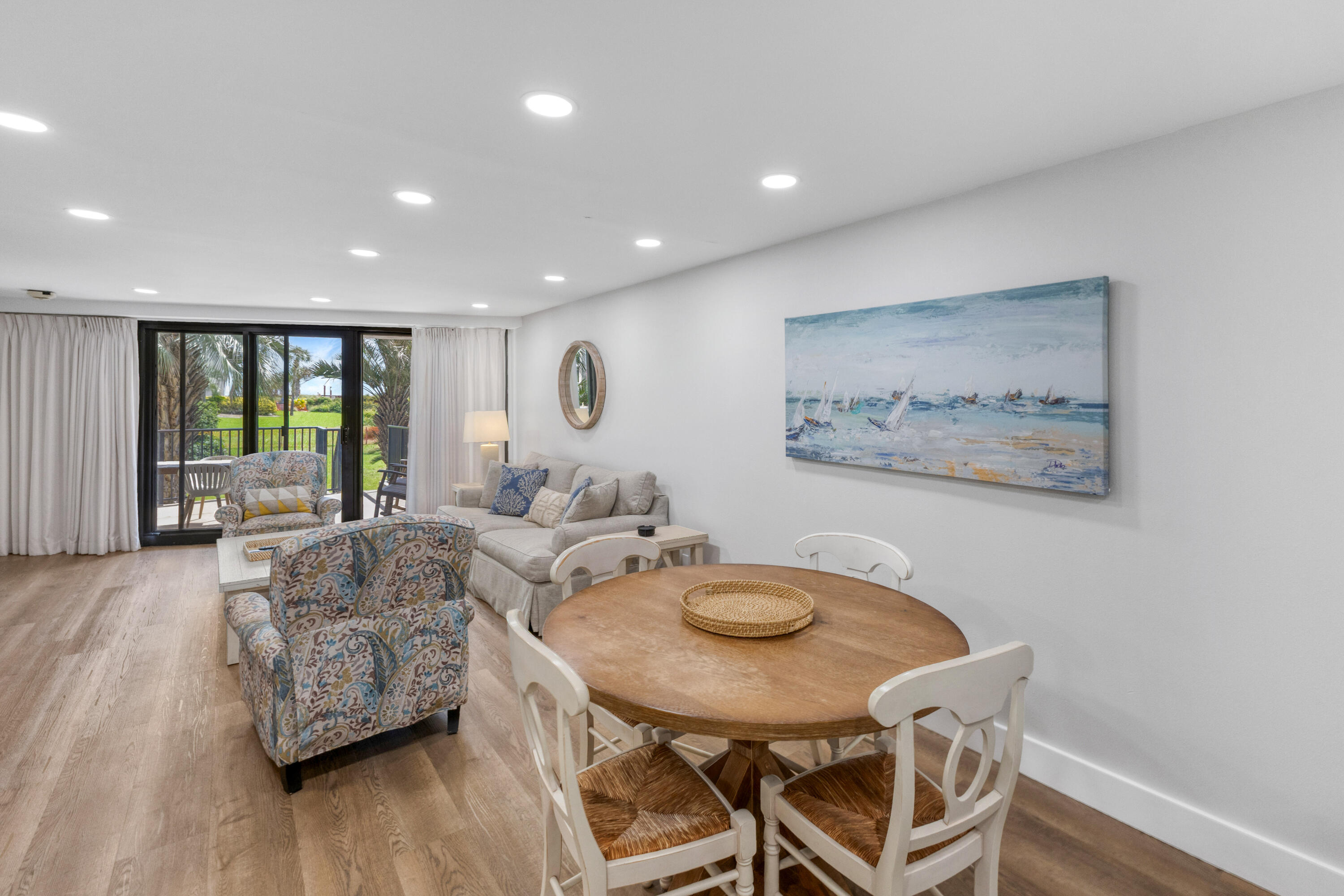 4017 Beachside 1, Unit 4017 Miramar Beach, FL 32550 - Photo 10 of 55 a living room with furniture and a wooden floor