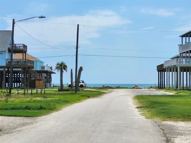 a childrens park with lots of swings and slides