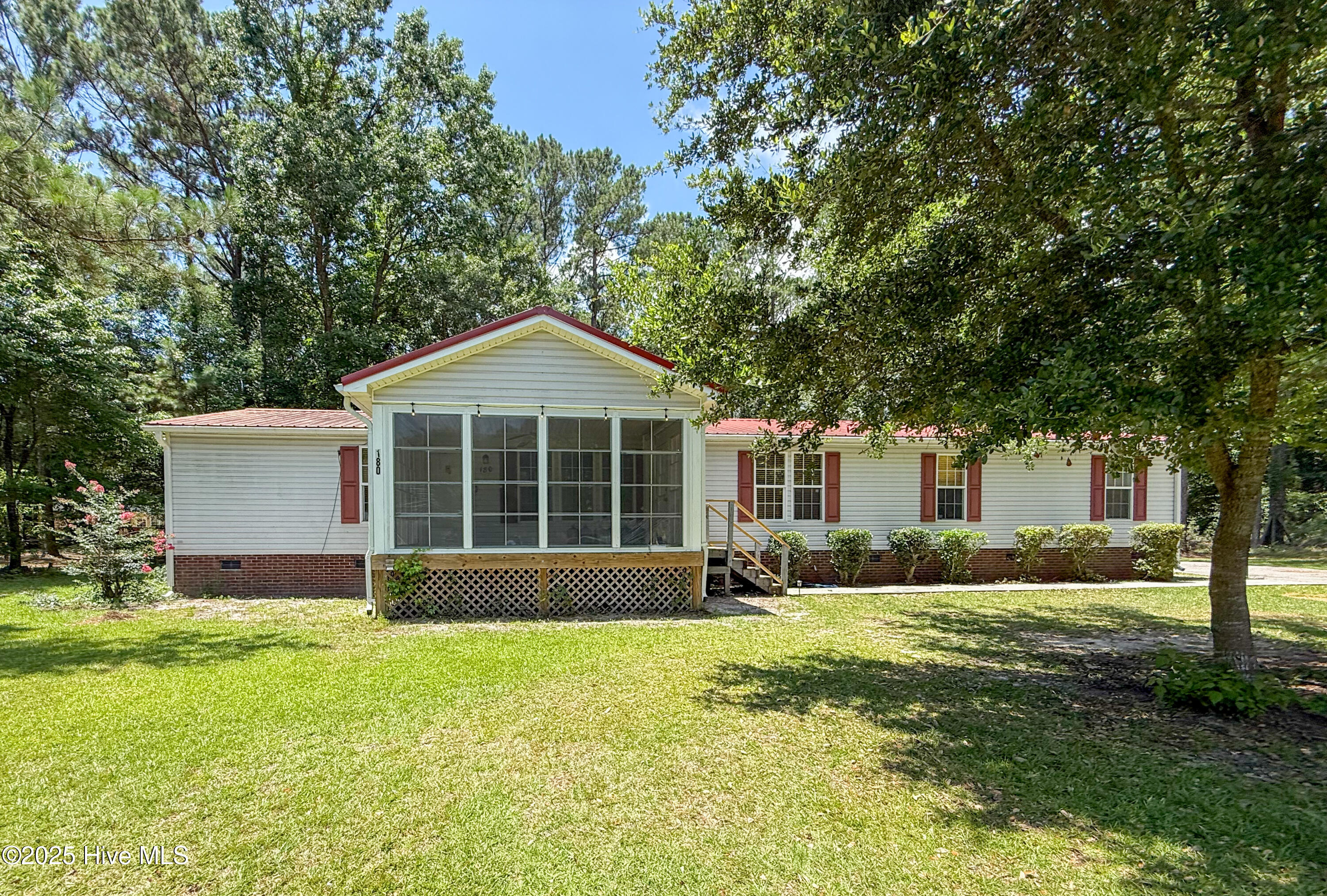 180 Quails Cove Hampstead, NC 28443 - Photo 2 of 62 Front of home