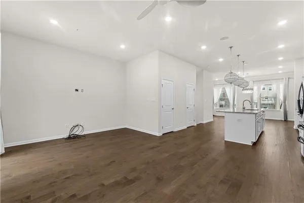 a bathroom with a toilet a sink and a mirror