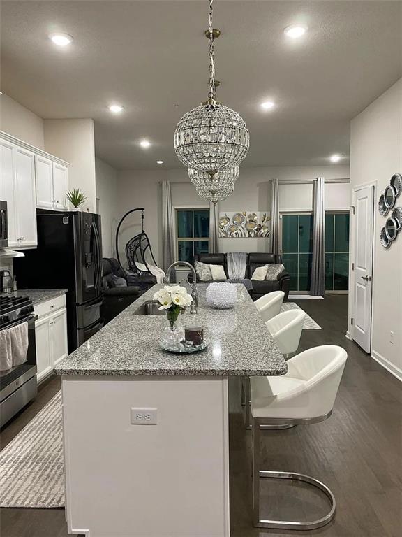 2008 Hemlock Lane Mars, PA 16046 - Photo 13 of 40 a view of a kitchen with granite countertop a sink stainless steel appliances and living room view