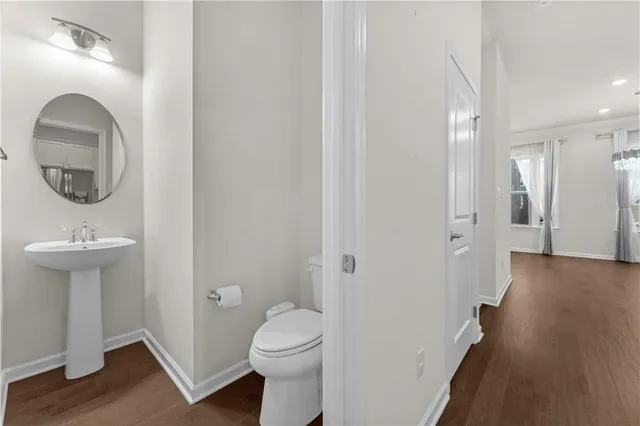 a bathroom with a shower and a toilet