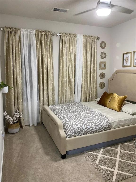 2008 Hemlock Lane Mars, PA 16046 - Photo 25 of 40 a bed sitting in a bedroom next to a window and a chair