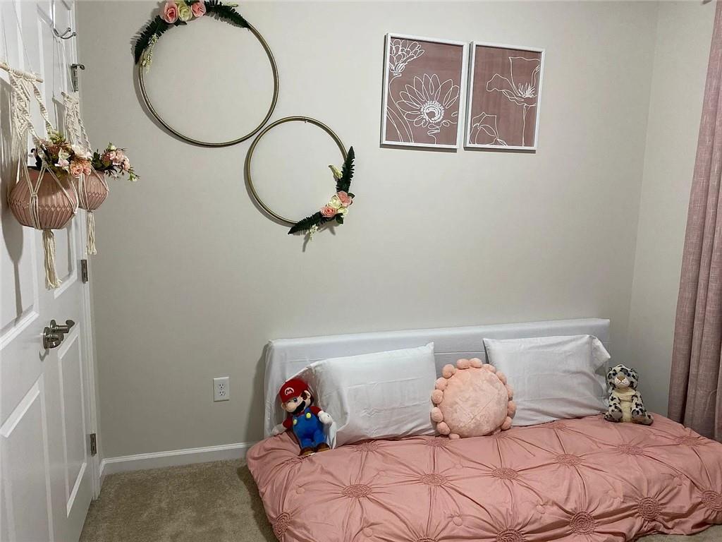 2008 Hemlock Lane Mars, PA 16046 - Photo 29 of 40 a bedroom with a bed and a chandelier