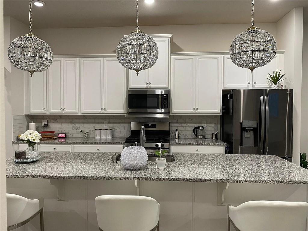 2008 Hemlock Lane Mars, PA 16046 - Photo 8 of 47 a kitchen with granite countertop a counter space a sink and cabinets