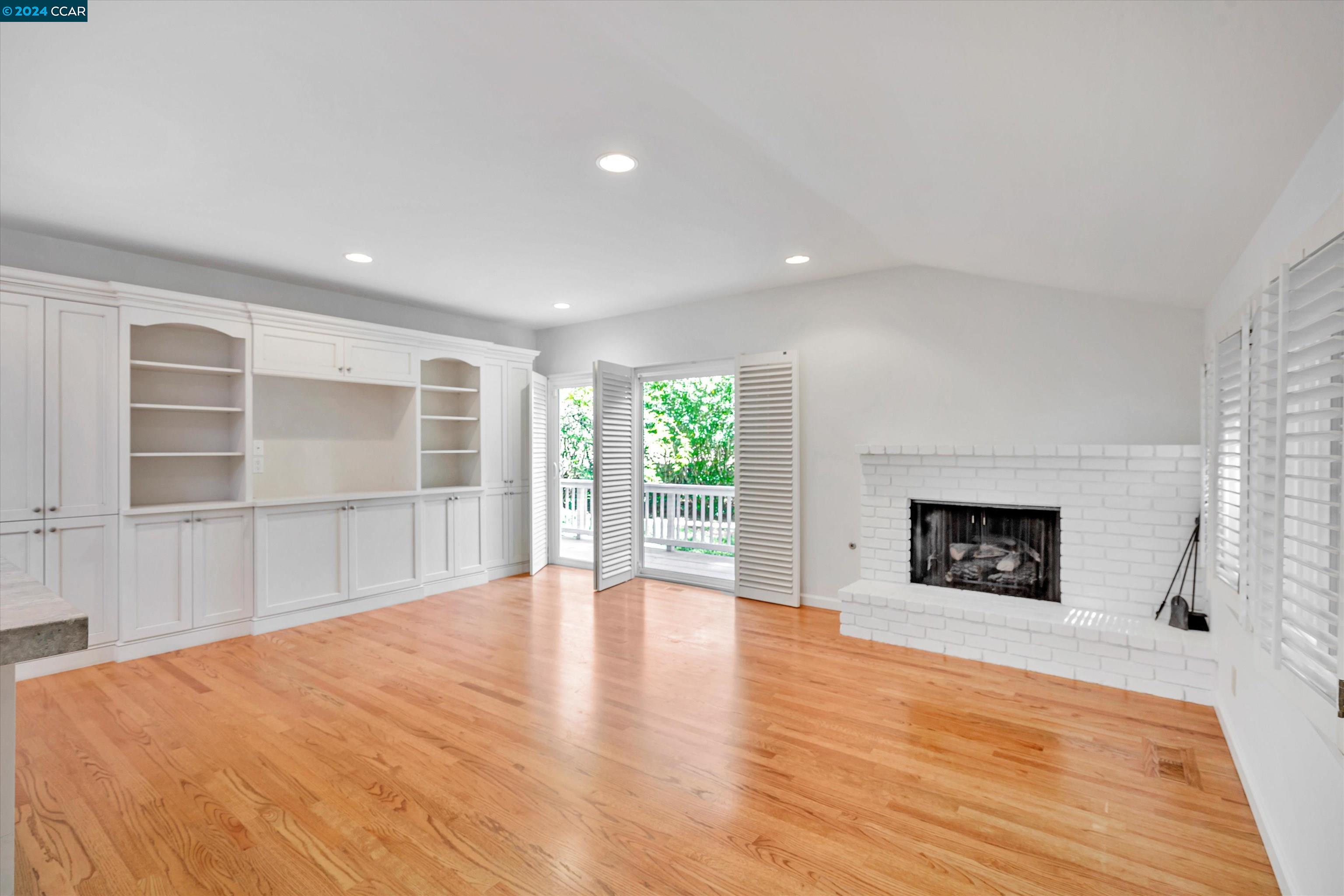 4105 Happy Valley Road Lafayette, CA 94549 - Photo 12 of 30 a view of an empty room with a window and fireplace