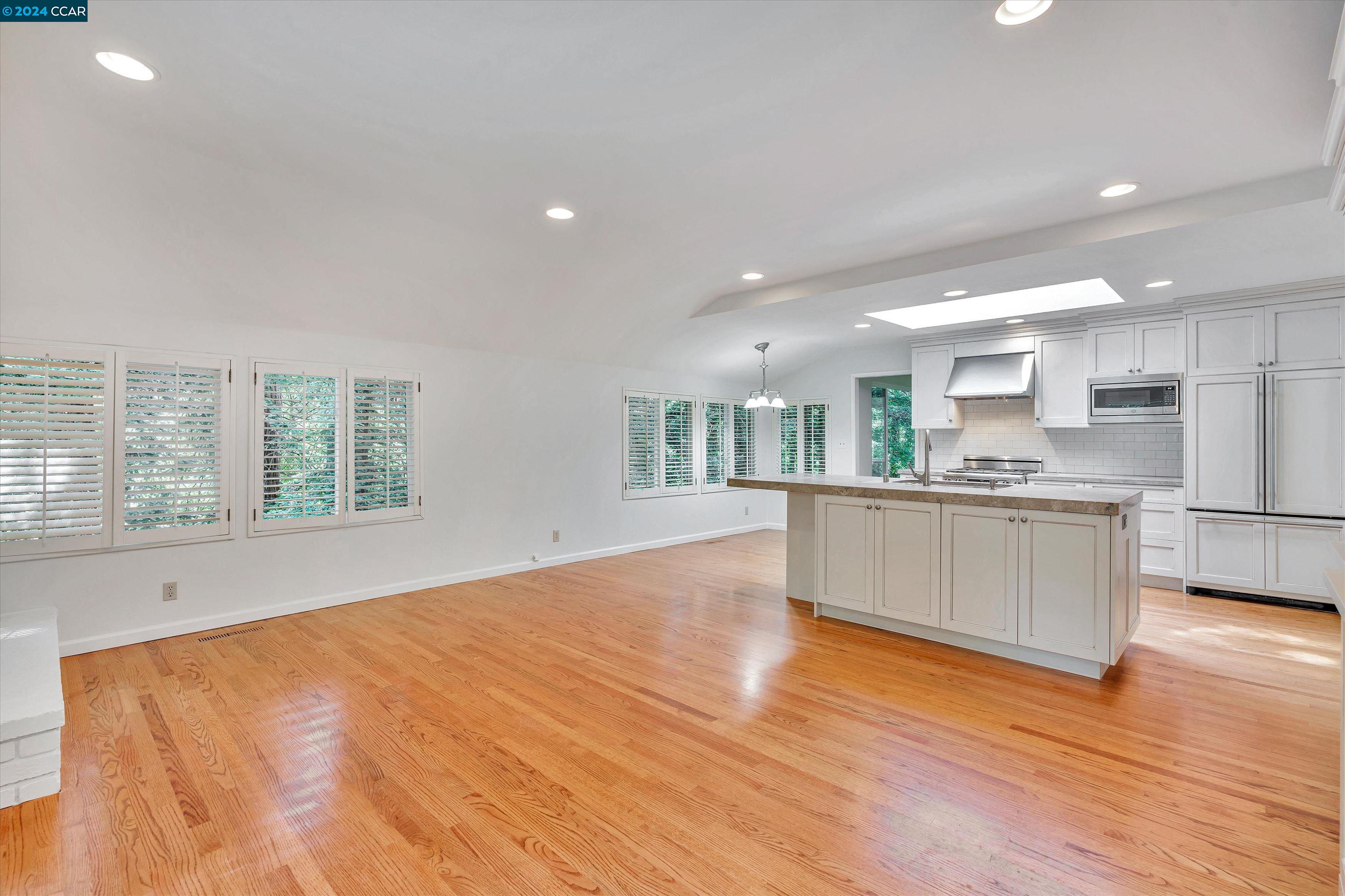 4105 Happy Valley Road Lafayette, CA 94549 - Photo 13 of 30 a view of kitchen with wooden floor and electronic appliances