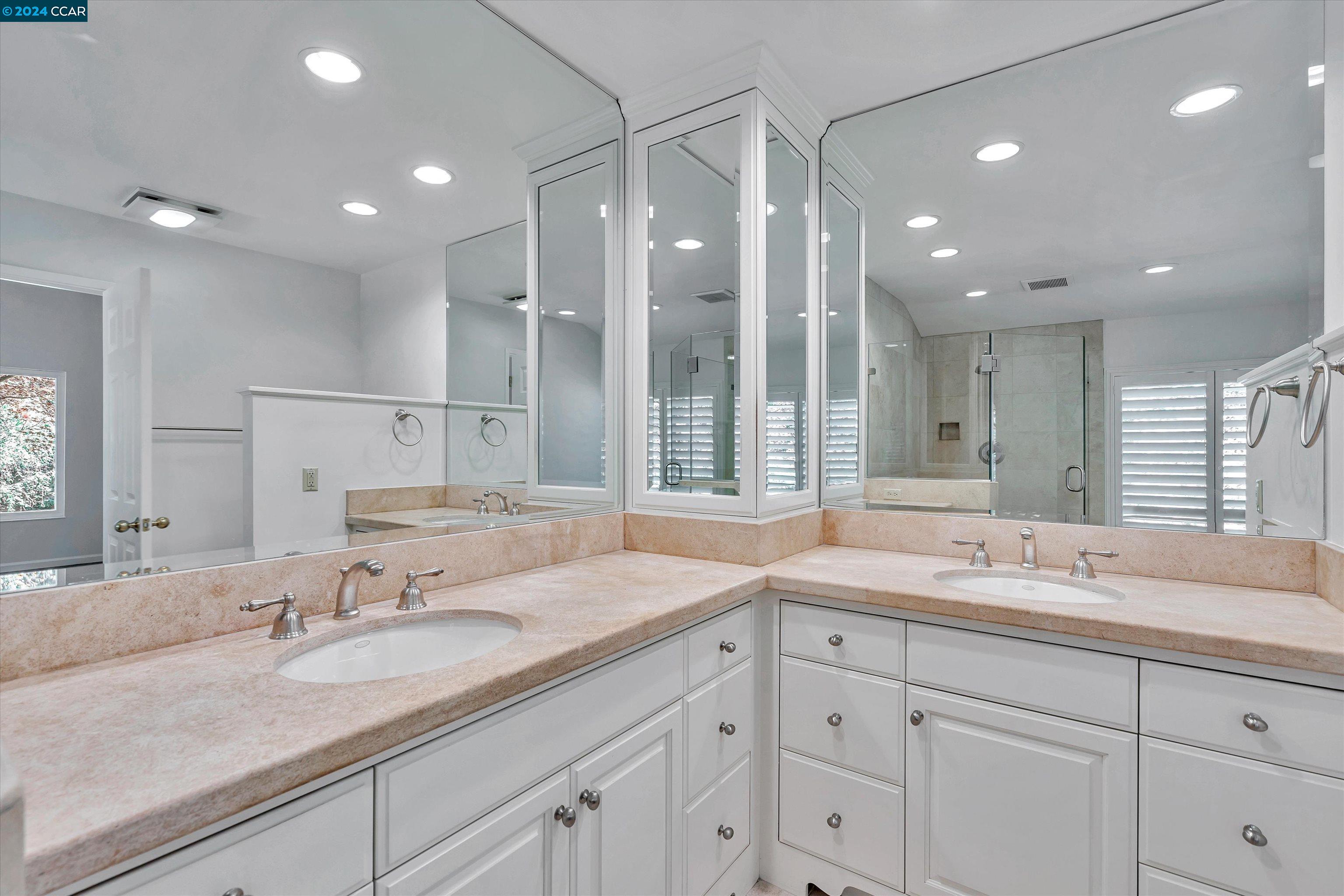 4105 Happy Valley Road Lafayette, CA 94549 - Photo 18 of 30 a bathroom with a sink double vanity and a mirror