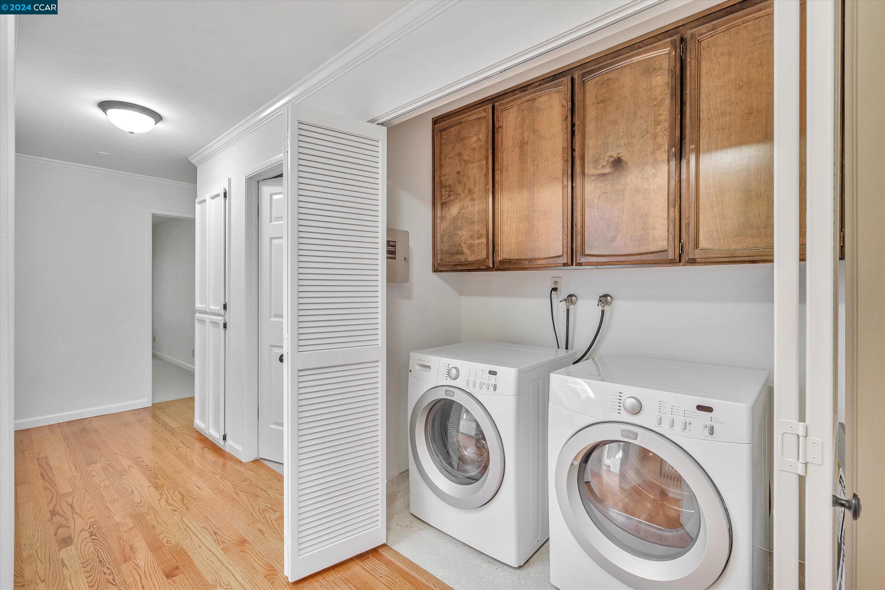 4105 Happy Valley Road Lafayette, CA 94549 - Photo 23 of 30 a view of washer and dryer with bathroom in the background