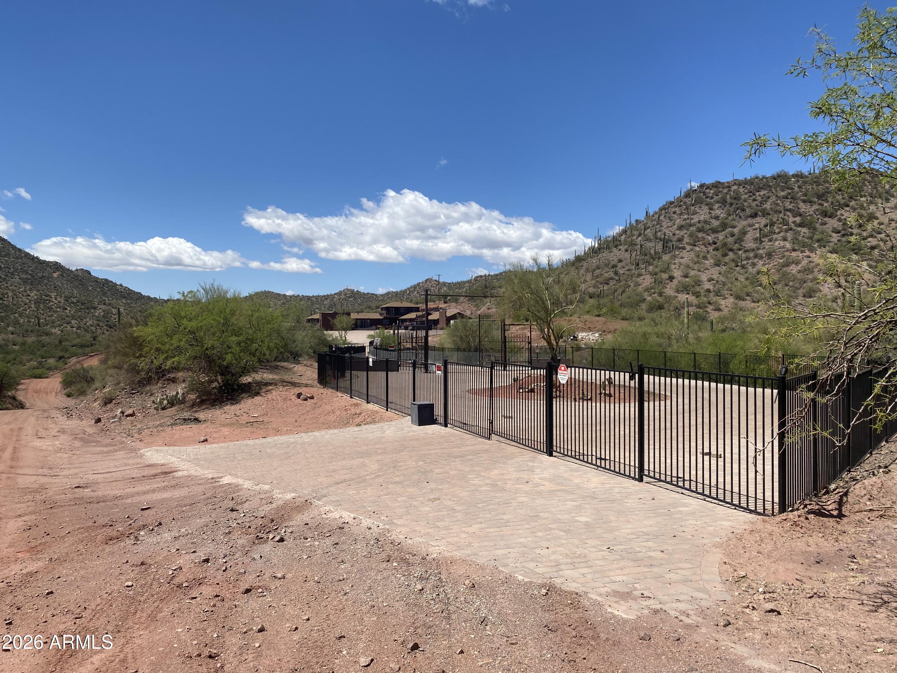 37750 Cow Creek Road, Unit D Morristown, AZ 85342 - Photo 26 of 35 a view of a backyard of the house