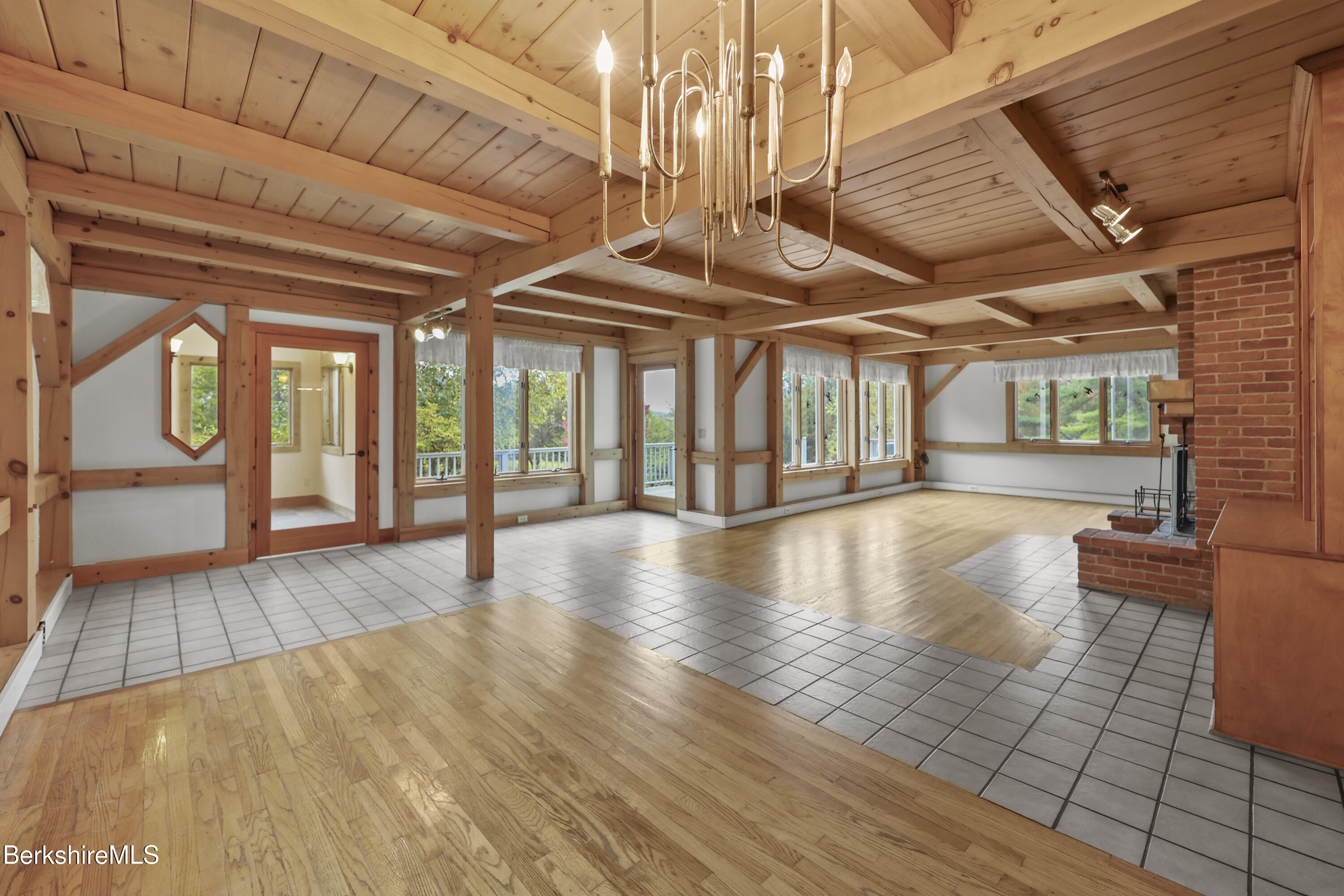 1030 Simonds Road Williamstown, MA 01267 - Photo 9 of 76 a view of an empty room with wooden floor