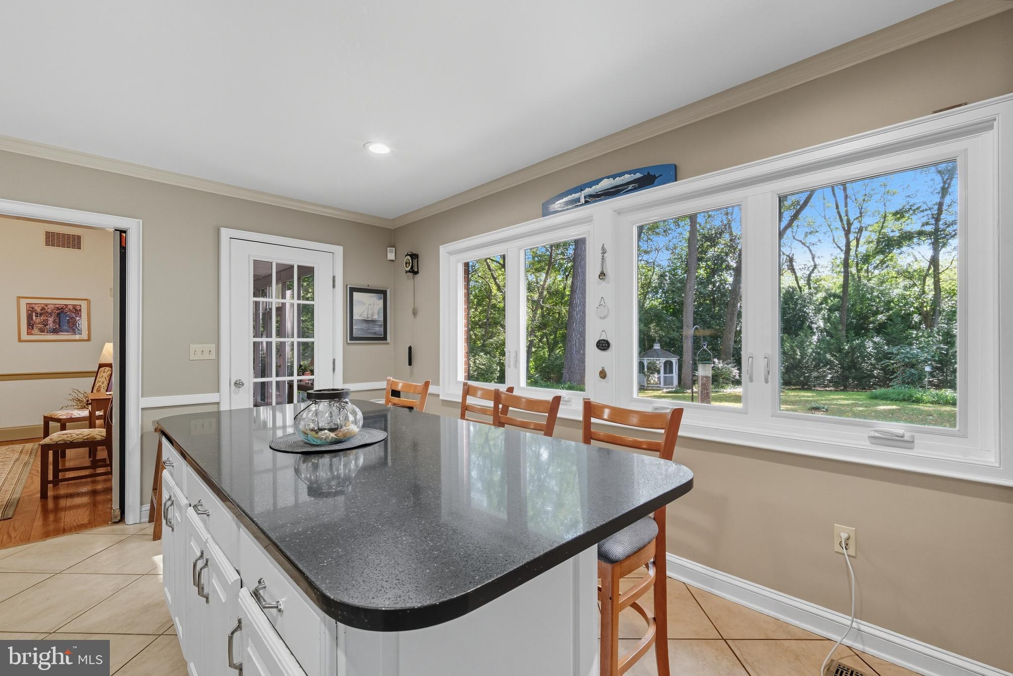 13983 Turners Point Road Kennedyville, MD 21645 - Photo 13 of 62 a dining room with furniture and large windows