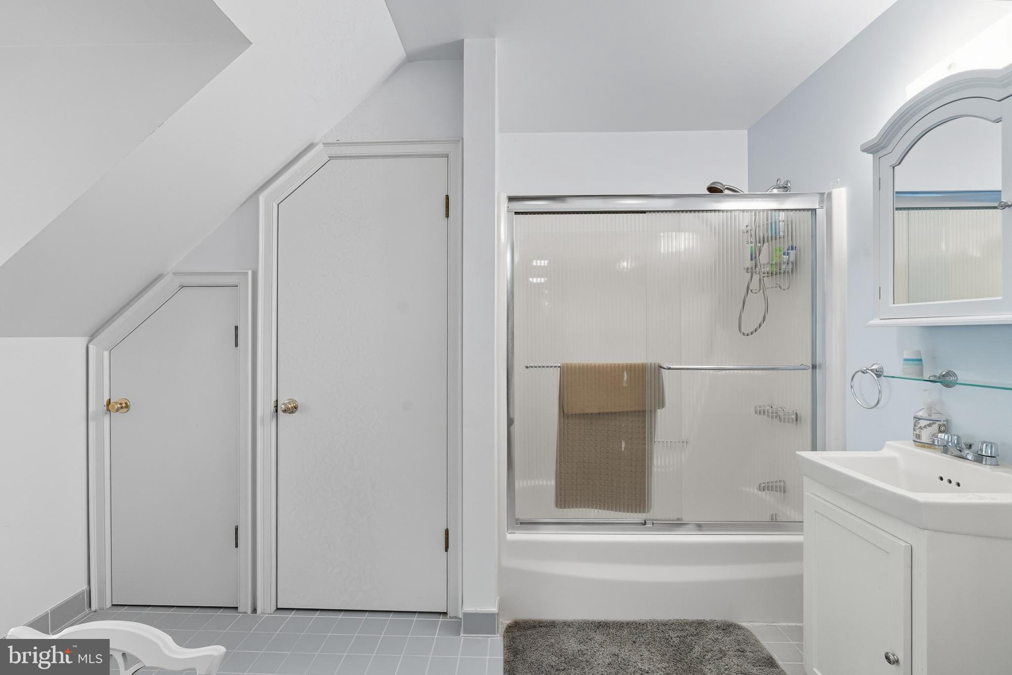 13983 Turners Point Road Kennedyville, MD 21645 - Photo 26 of 62 a bathroom with a shower and a sink