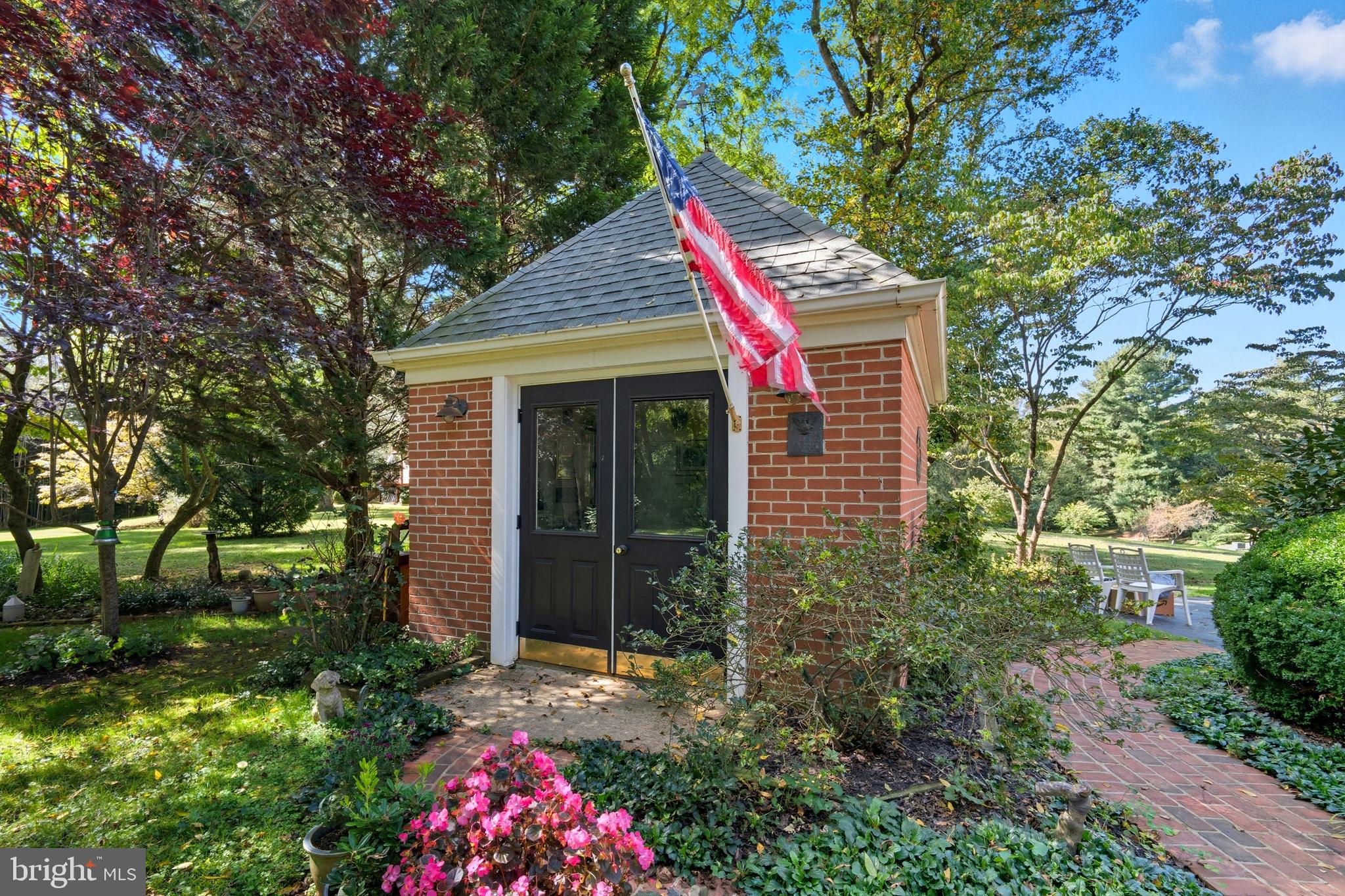 13983 Turners Point Road Kennedyville, MD 21645 - Photo 33 of 62 a view of a house with a small yard and a large tree