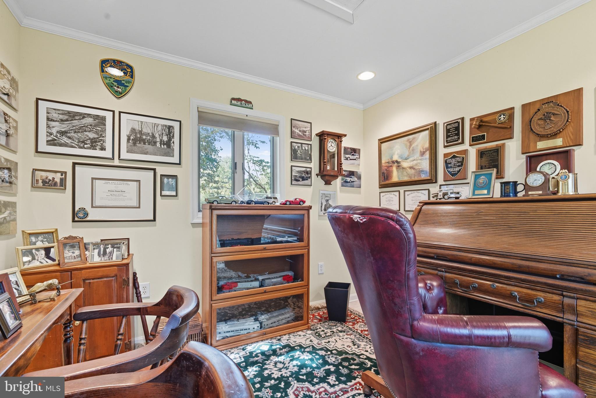 13983 Turners Point Road Kennedyville, MD 21645 - Photo 34 of 62 a living room with furniture a piano and a bookshelf