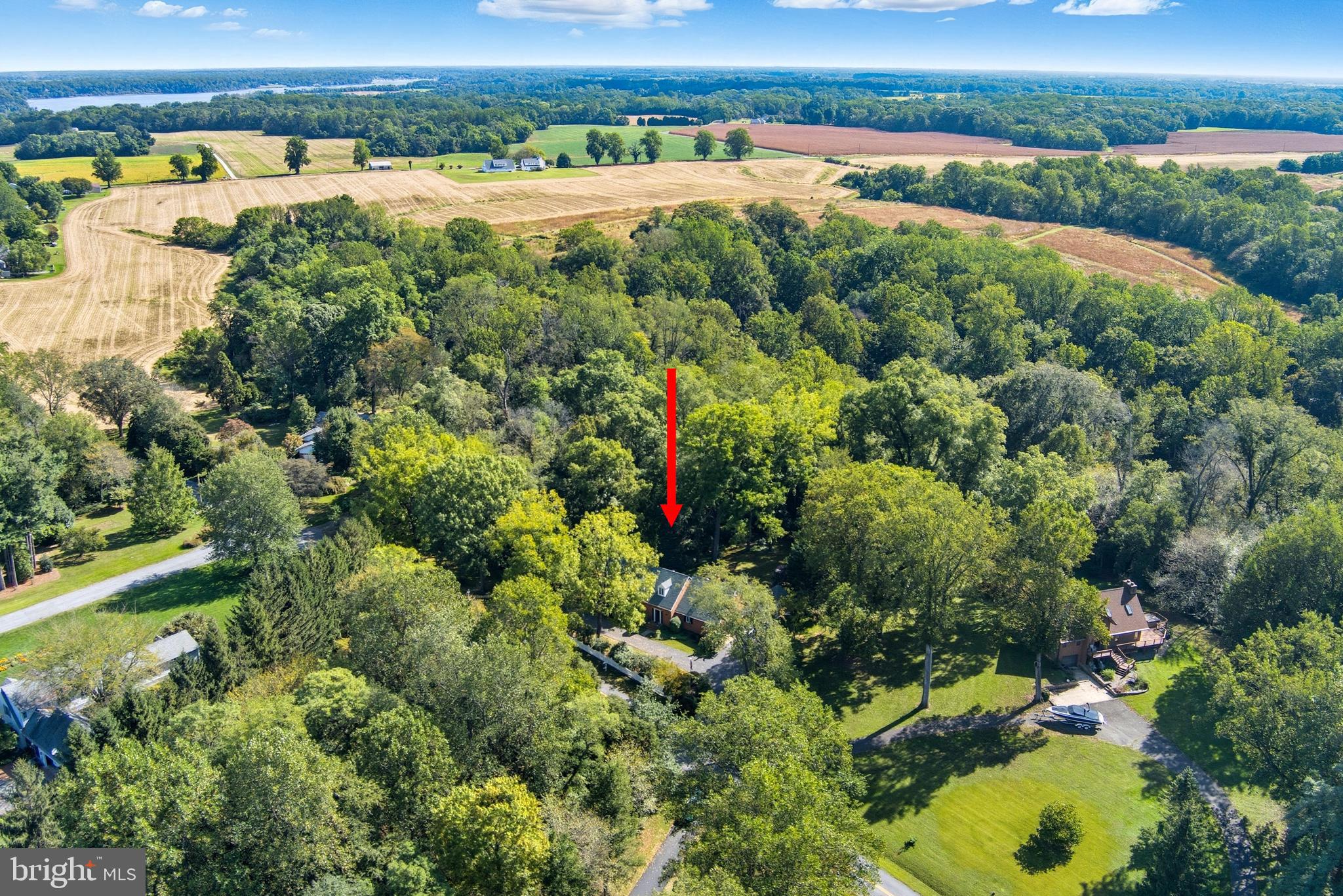 13983 Turners Point Road Kennedyville, MD 21645 - Photo 51 of 62 an aerial view of a houses with a yard and lake view