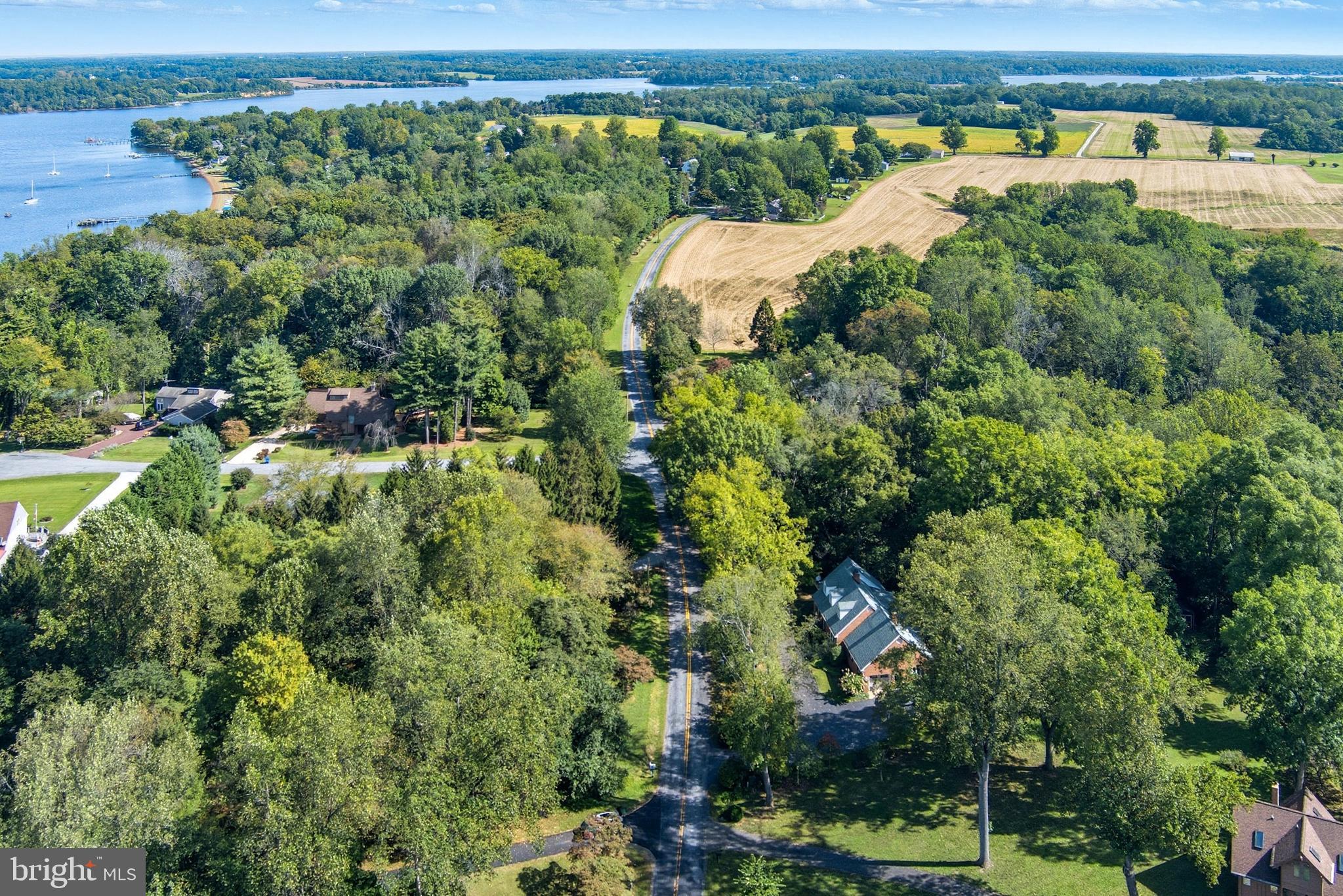 13983 Turners Point Road Kennedyville, MD 21645 - Photo 56 of 62 an aerial view of a houses with a yard