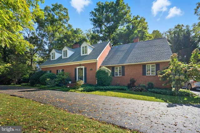 a view of an entryway and wooden floor