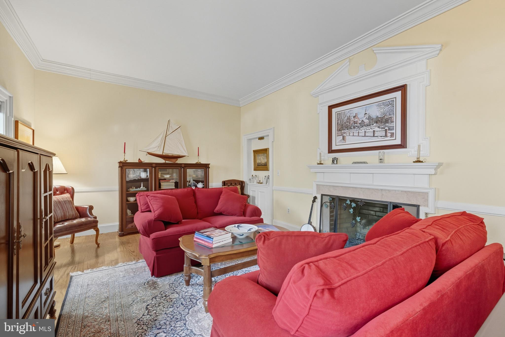 13983 Turners Point Road Kennedyville, MD 21645 - Photo 10 of 62 a living room with furniture or fireplace and a wooden floor
