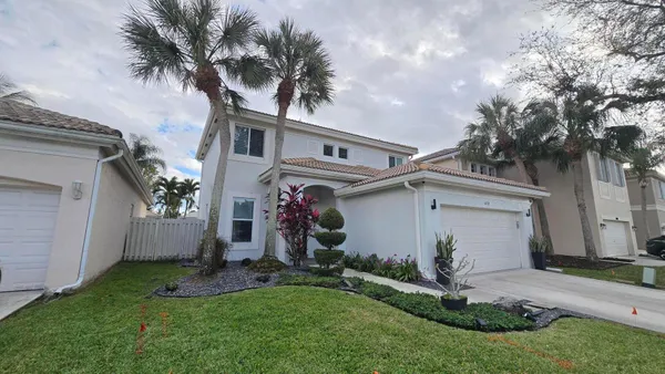 a front view of house with yard
