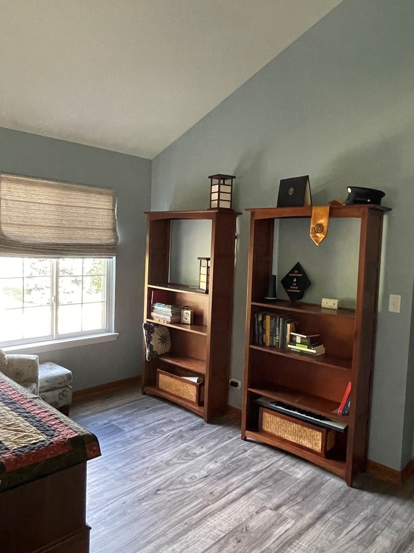 2552 Hatfield Court Elgin, IL 60123 - Photo 5 of 13 a bedroom with furniture and a window