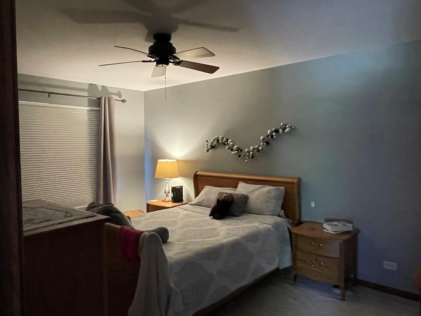 2552 Hatfield Court Elgin, IL 60123 - Photo 8 of 13 a bedroom with a bed and a ceiling fan