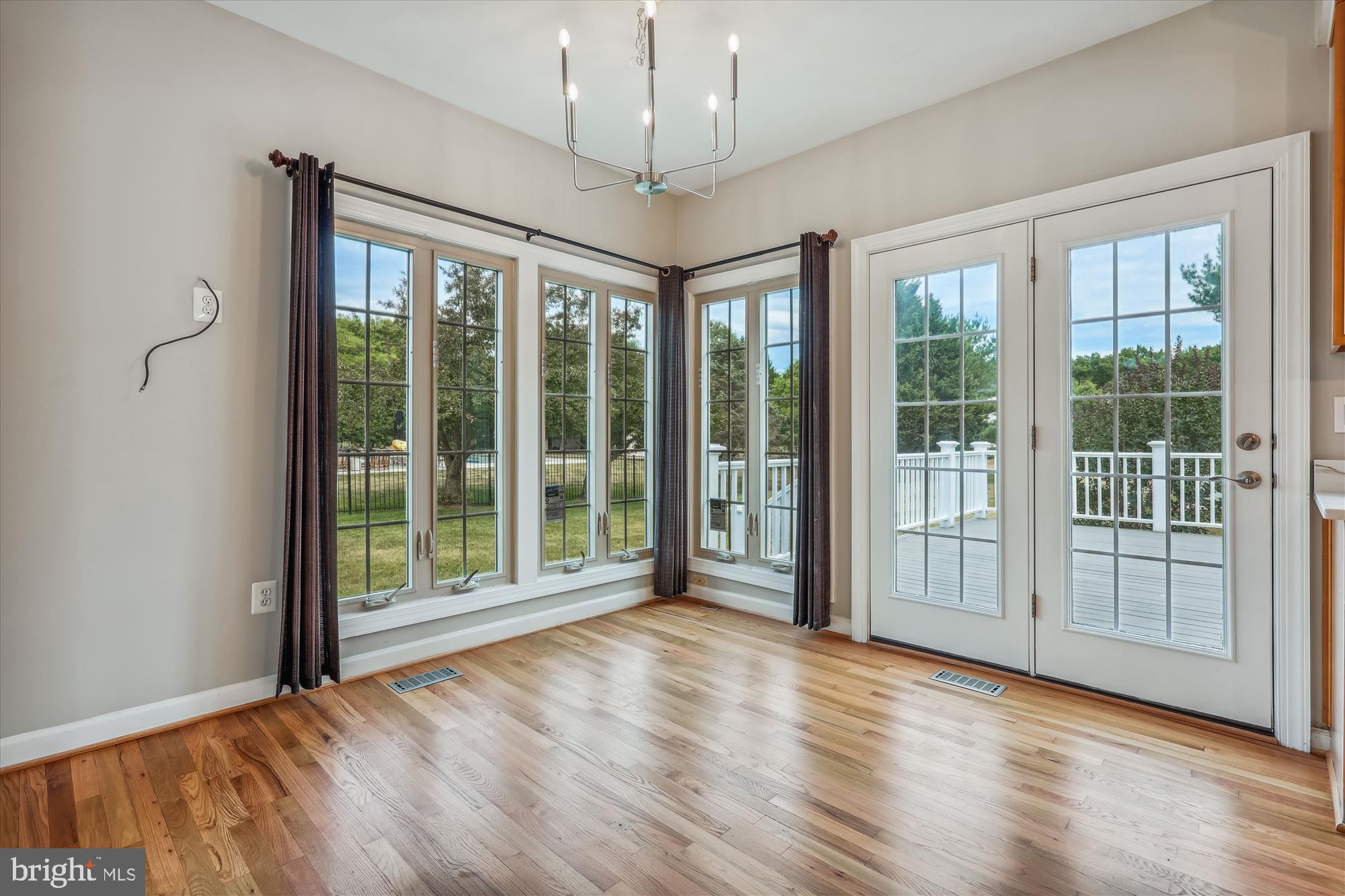 918 Brick Manor Circle Silver Spring, MD 20905 - Photo 20 of 64 A ton of windows, and door leading to deck