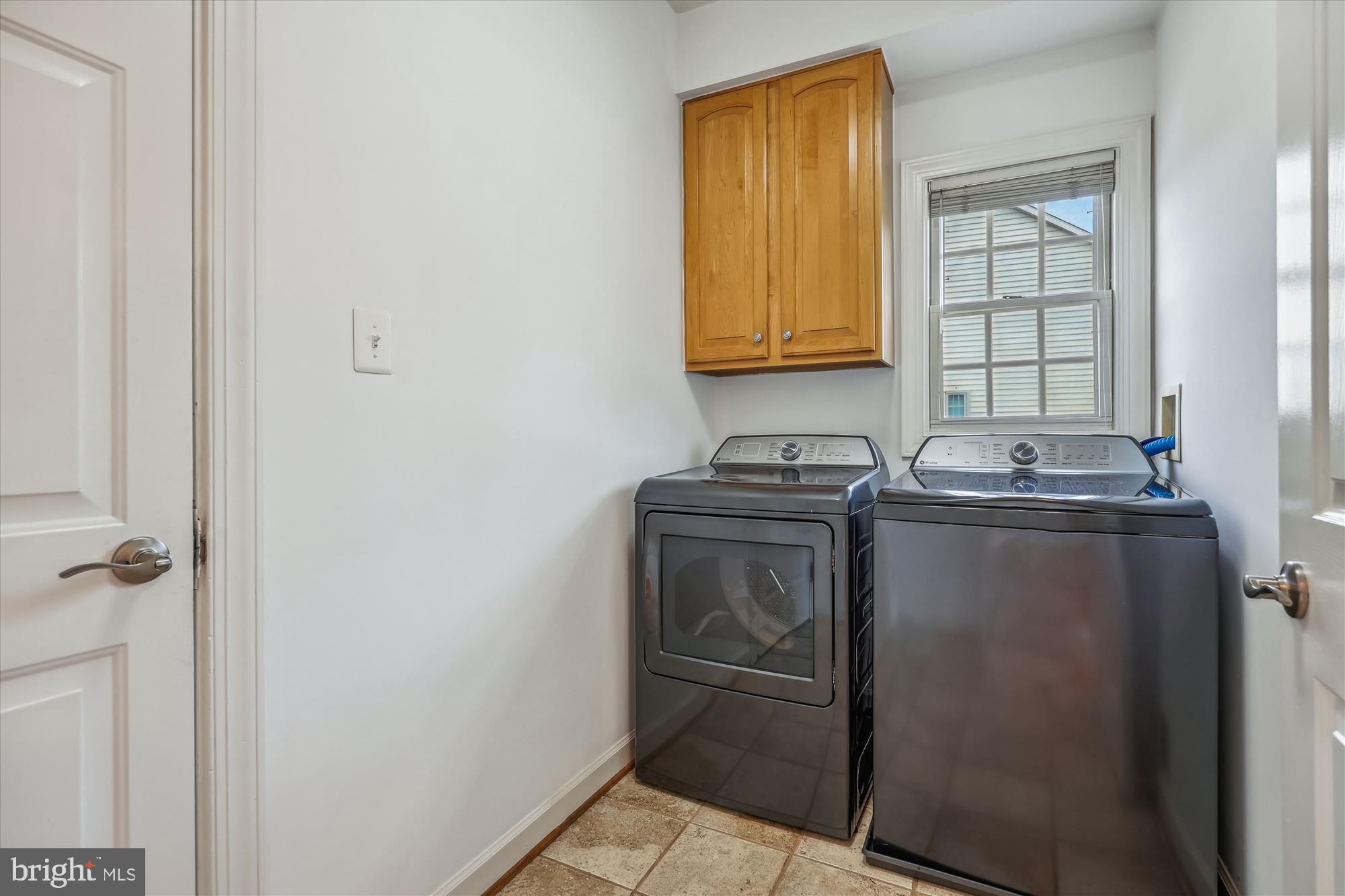 918 Brick Manor Circle Silver Spring, MD 20905 - Photo 21 of 64 Laundry room off the kitchen w/ new GE washer/drye