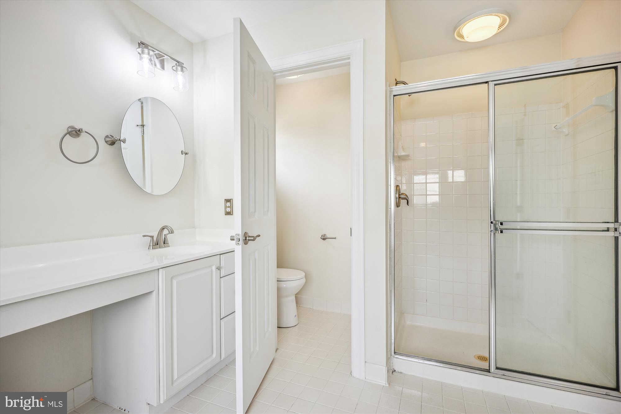 918 Brick Manor Circle Silver Spring, MD 20905 - Photo 38 of 64 Primary bath shower and water closet