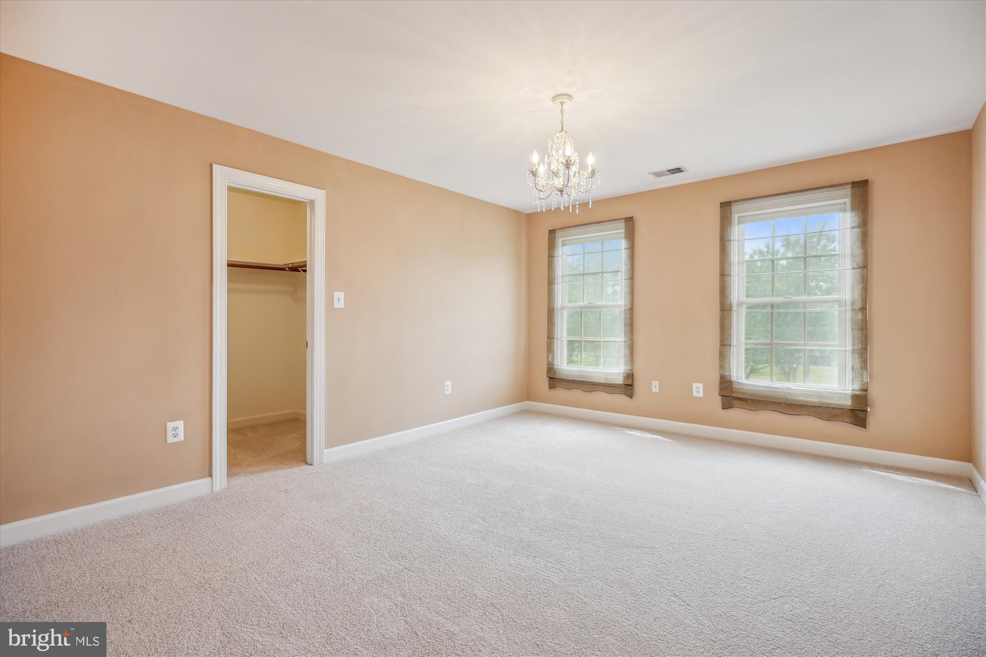 918 Brick Manor Circle Silver Spring, MD 20905 - Photo 41 of 64 Beige bedroom - faces front of house