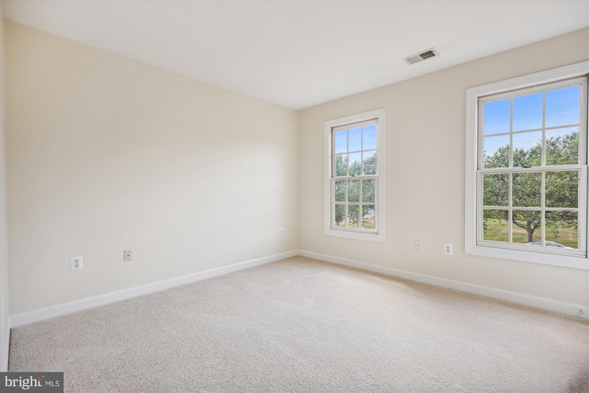 918 Brick Manor Circle Silver Spring, MD 20905 - Photo 45 of 64 Linen bedroom with a ton of light!