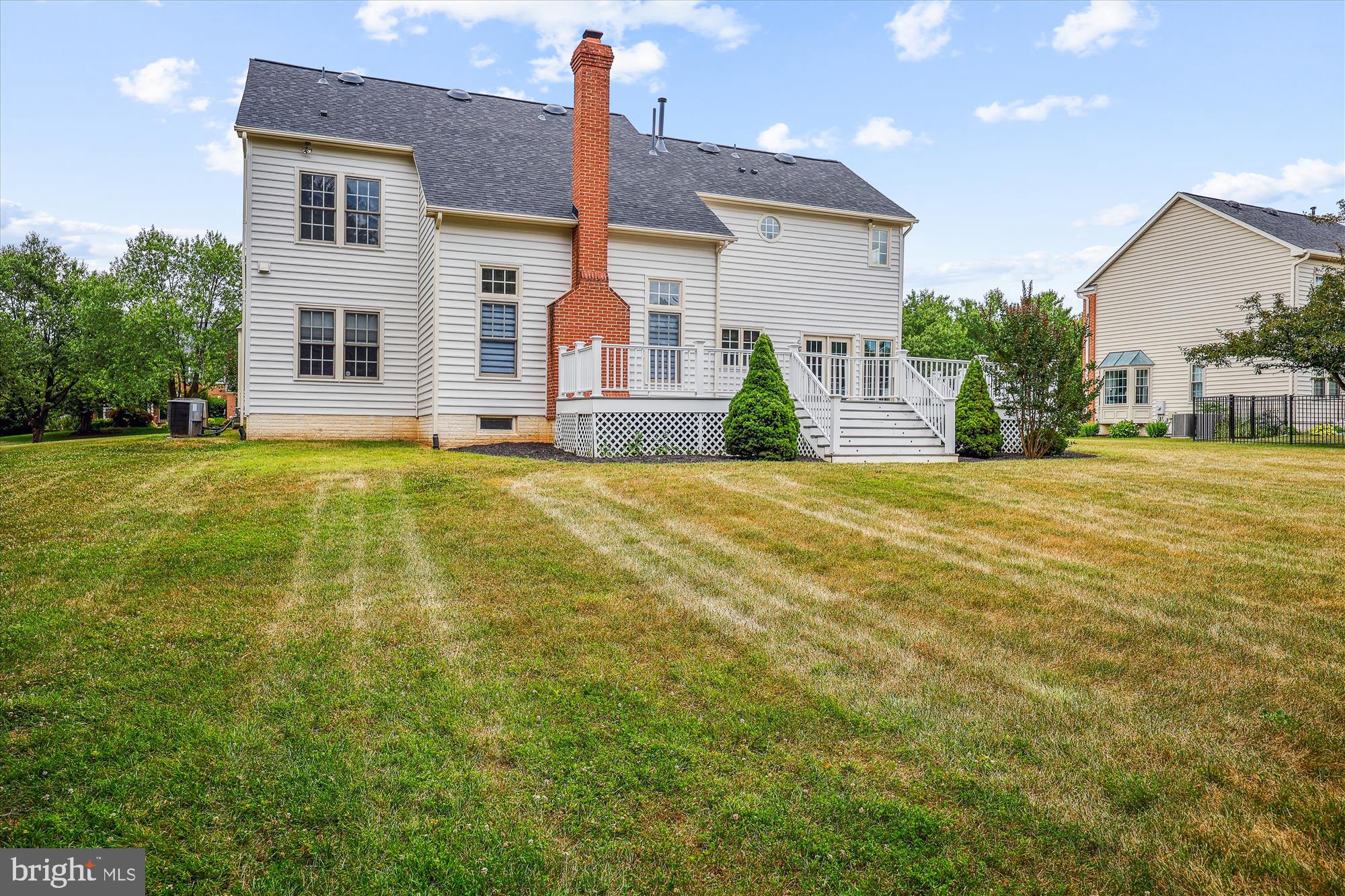 918 Brick Manor Circle Silver Spring, MD 20905 - Photo 57 of 64 Rear view of the house - house is on 0.6 acres!