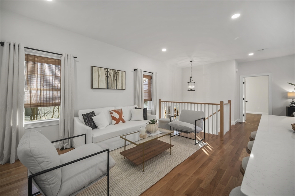 16 Clinton Street Marlborough, MA 01752 - Photo 14 of 39 a living room with furniture and a window