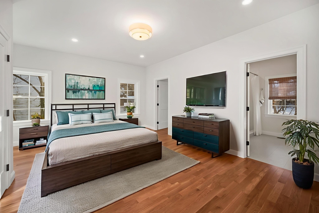 16 Clinton Street Marlborough, MA 01752 - Photo 19 of 39 a bedroom with a bed and a couch