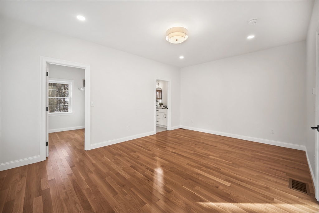 16 Clinton Street Marlborough, MA 01752 - Photo 20 of 39 a view of empty room with wooden floor
