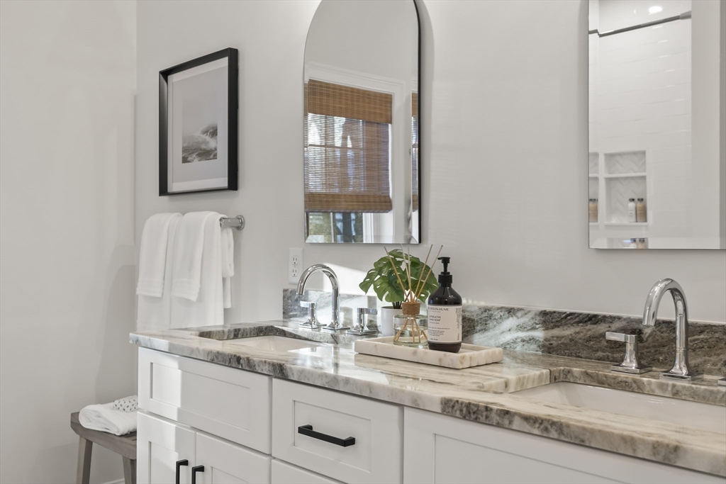 16 Clinton Street Marlborough, MA 01752 - Photo 23 of 39 a bathroom with sink and mirror