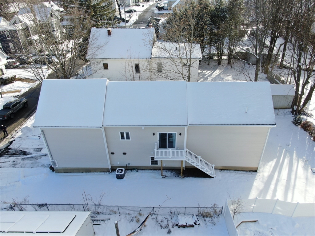 16 Clinton Street Marlborough, MA 01752 - Photo 34 of 39 an aerial view of a house with a yard