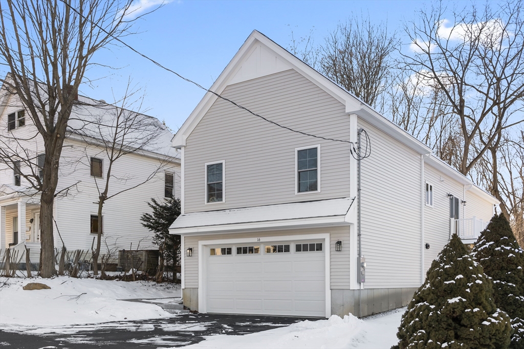 16 Clinton Street Marlborough, MA 01752 - Photo 35 of 39 a view of a white house with a street